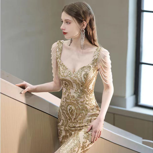 Transform into a dinner party queen in 5 steps: the secret of the gold fishtail dress!